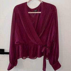 Women’s wrap blouse, wine color, long sleeve.